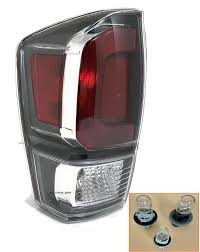 8156004210 LAMP ASSEMBLY, LH (DRIVER SIDE)- HALOGEN- MATTE GREY BEZEL- W/ CHROME TRIM- TRD SPORT / TRD OFF-ROAD MODELS Ho OEM auto part