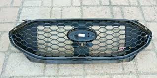PJ6Z8200F GRILLE ASSEMBLY- MATTE BLACK- W/ CAMERA HOLE- ST-LINE SELECT / ST-LINE ELITE MODELS OEM auto part