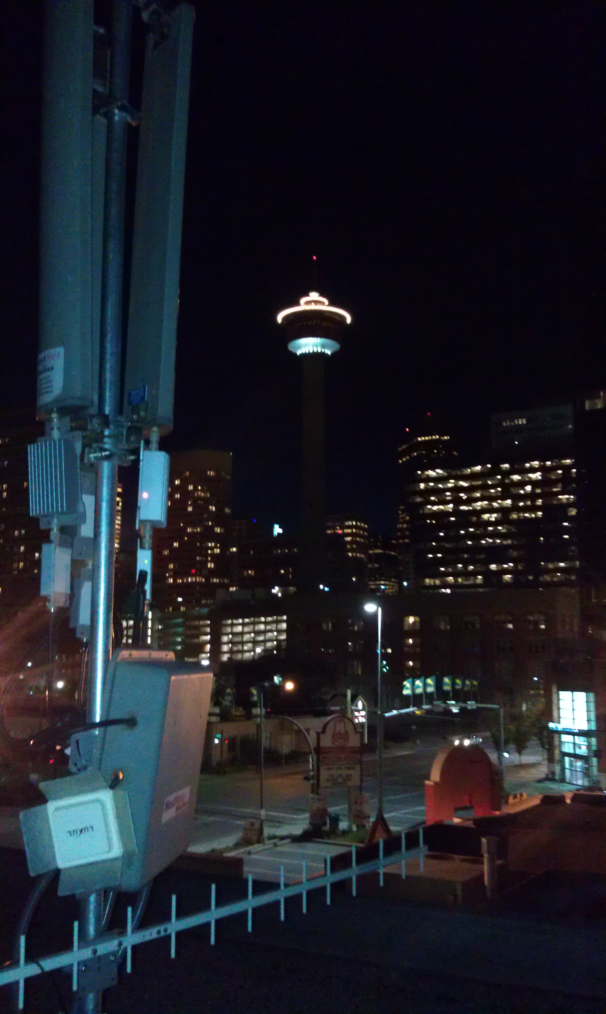 WestNet rooftop tower site — Calgary Tower skyline in background, August 2012